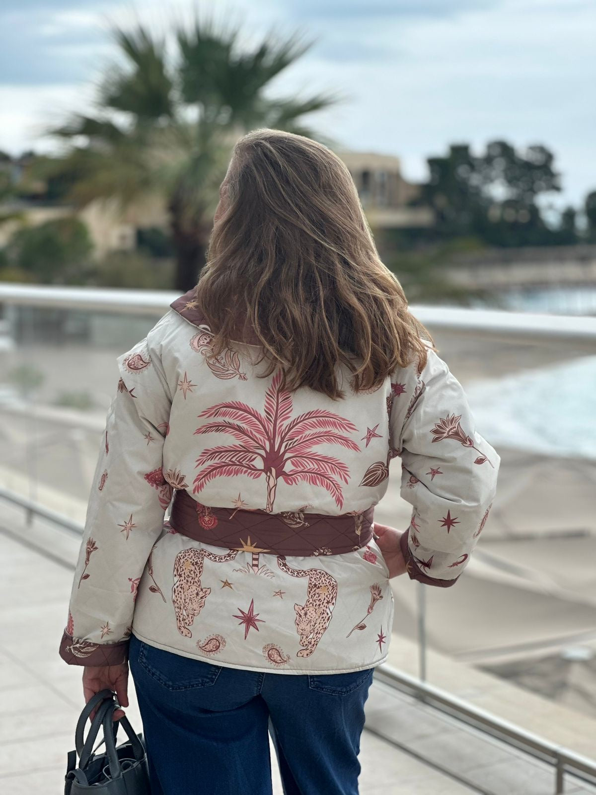 Double sided maroon palm vest