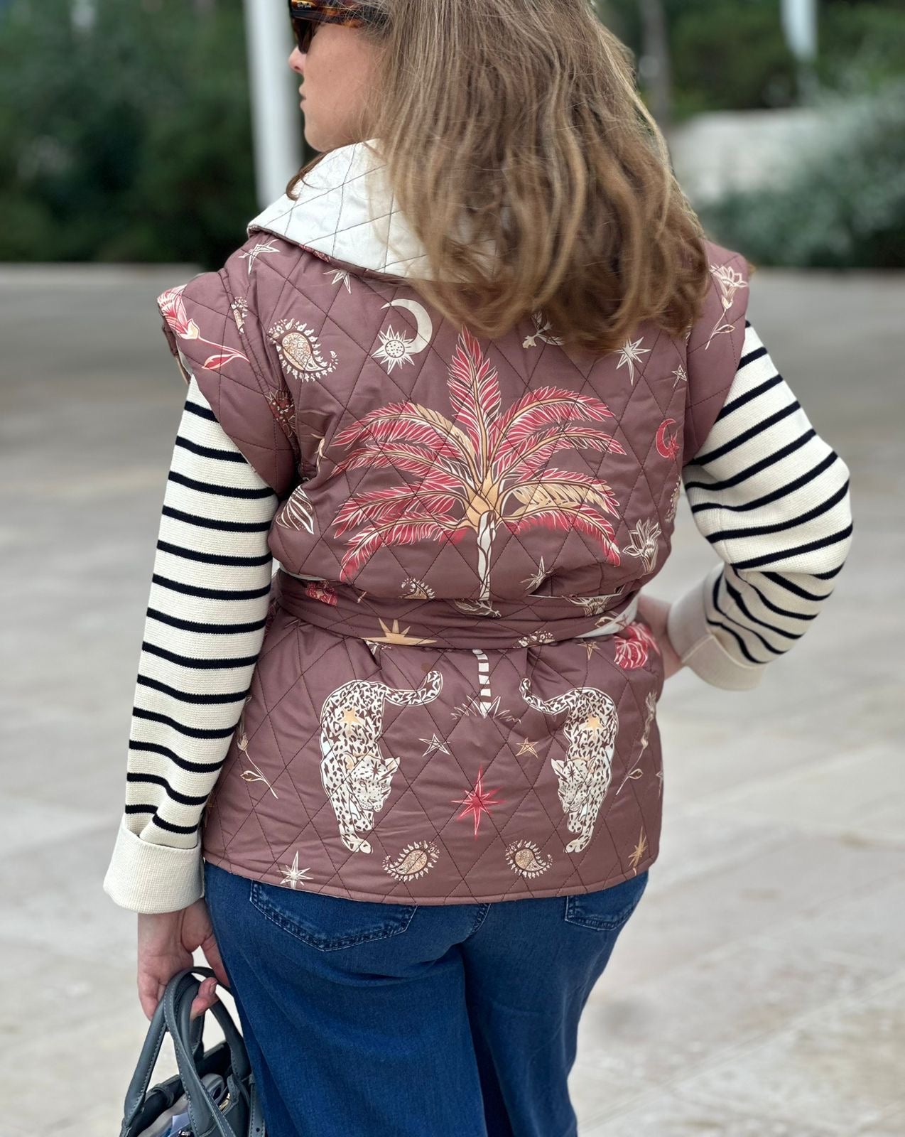 Double sided maroon palm vest