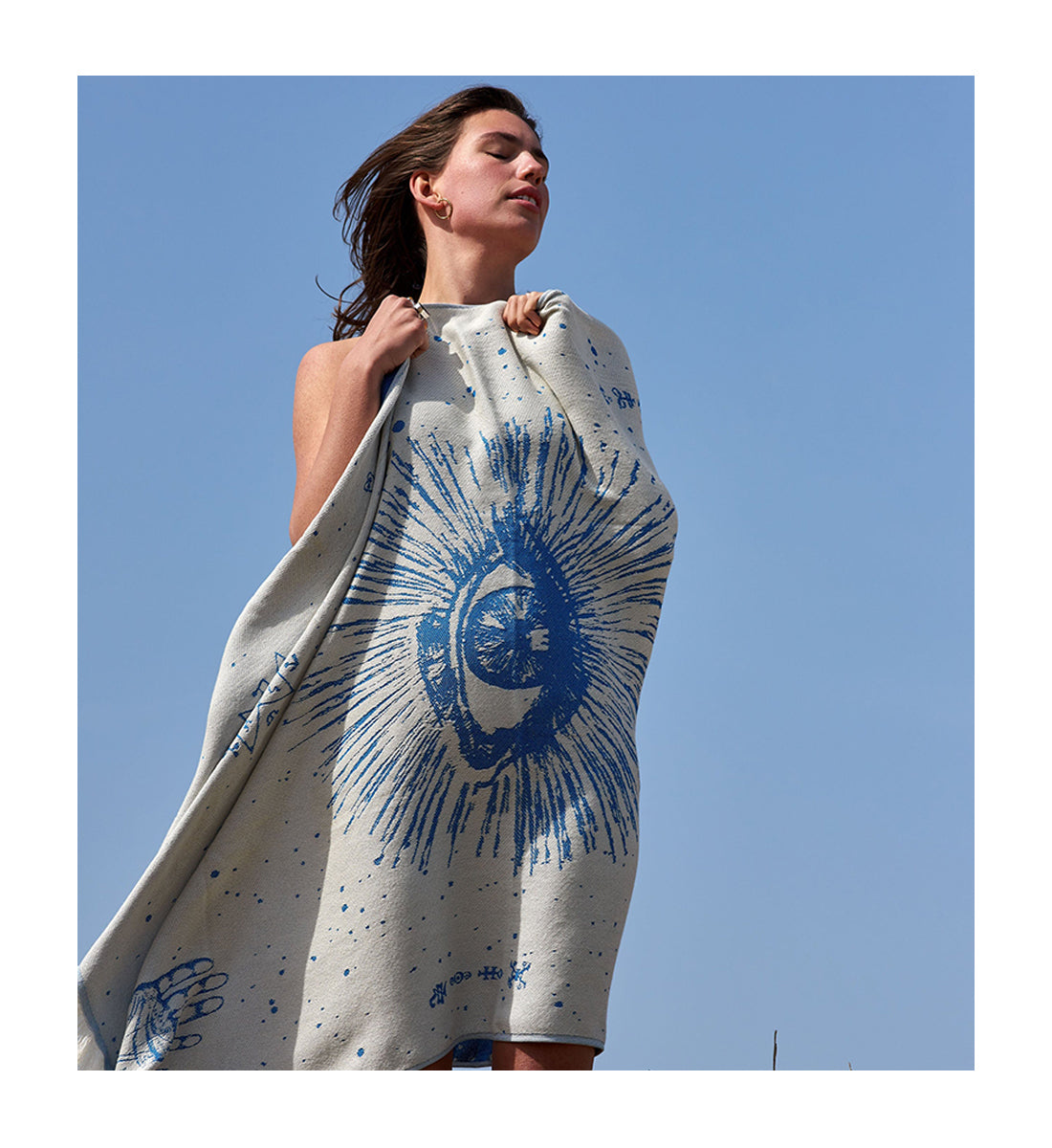 The Cosmos Eye Bright Blue Feather Beach Towel